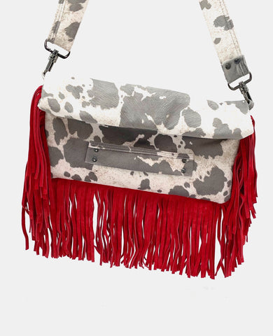 Oversized Fringe Clutch in Cow Print